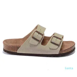 Projektantki mężczyzn Sandały Sandały unisex kapcie caliente verano flip flip flops hombres mujeres plażowe suwaki na zewnątrz halowe muły Woody