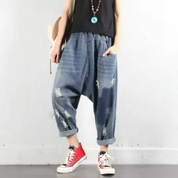 Dżinsy rozryte dżinsy krzyżowe 2019 Kobiety Hip Hop Streetwear workowane harem dżinsy chłopaków Pants szerokie nogi kropli krocze dżinsowe kwiaty