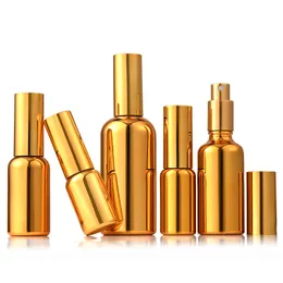 Frascos de perfume de óleo essencial de vidro cosmético com bomba de ouro de 100ml com spray para cuidados pessoais