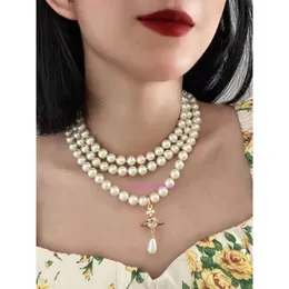 Choker Vivianeismus Westwoodismus Halskette gleiche Saturn Perlenkette 3d UFO Planet Anhänger Elegante elegante mehrschichtige Neckkette Frau