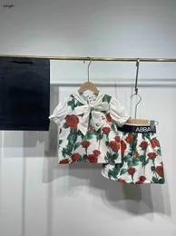 Varumärkesflickor Tracksuits Cotton Kids Dress Suits Storlek 110-160 Bow Collar Lantern Sleeve T-shirt och blommig tryckkjol Jan10
