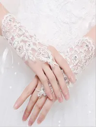 Schicke kurze Hochzeitshandschuhe mit Spitzenapplikationen, fingerlose Handschuhe für Frauen, Braut, Weiß, Elfenbein, Perlen, Luva De Noiva, Brautaccessoires AL71022952