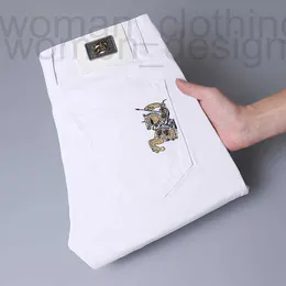 Diseñador Jeans para hombres Diseñador Primavera y verano Nuevos jeans para hombres Luz de lujo Versión coreana Delgado Elástico Pie pequeño Algodón delgado Pantalones blancos puros SE20 JG17