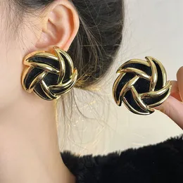 Orecchini a spirale in pelle scamosciata di metallo lucido retrò moda Orecchini a bottone esagerati più grandi da donna di lusso Gioielli di design E500