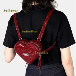 Kvällspåsar kvällspåsar 2024 designer väskor för kvinnor mönster ryggsäck japansk tendens mode axel crossbody väska hjärtmini bokväskor för kvinnor plånbok