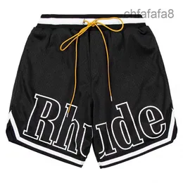 Pantaloncini firmati Rhude Capsule da uomo Pantaloni da spiaggia estivi Materiale a rete Sudore traspirante Allentato Fitness Basket Uomo corto Nero G7S0