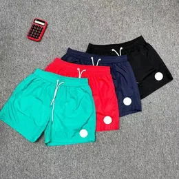 Pantaloncini da bagno firmati Etichetta ricamata bianca Costumi da bagno da uomo Pantaloncini da spiaggia da donna di lusso Impermeabili Asciugatura rapida con pantaloni sportivi da yoga traspiranti in rete Estate