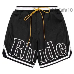 Designer shorts rhude mäns kapsel sommarstrandbyxor mesh material andas svett lös fitness basket män kort svart vere