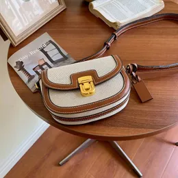 Kleine Retro-Einschulter-Crossbody-Satteltasche aus Segeltuch mit kontrastierenden Einsätzen 240115