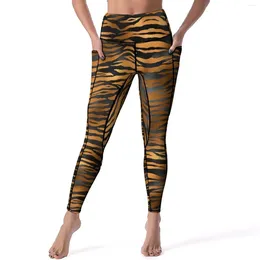Leggings de mujer con estampado de tigre a rayas, pantalones de Yoga de cintura alta negros y dorados, mallas divertidas de secado rápido, diseño femenino