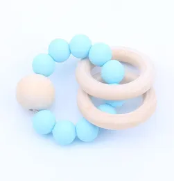 خواتم Baby Teether Rings Food Grade Beech Wood Bearing So Pticks Toys Shower Play Round Round Bead Wooden Newborn Silicone Teathers 1232252