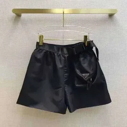 Män shorts mäns designer shorts badkläder strand badstammar simning baddräkter män tryckning casual löpande sport korta byxor triangel träning 1133ess