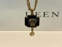 AM nuova collana in oro antico con quadrante in ottone e cristallo nero con teschio impreziosito da un elegante stile punk9822827