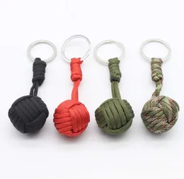 Nuovo design Paracord Portachiavi Cordino Pugno Nodo Cavo per paracadute ad alta resistenza Ciondolo a sfera in acciaio Sopravvivenza di emergenza esterna Strumento di autodifesa Portachiavi Gadget