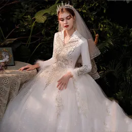 2024 Luxus Arabisch Eine Linie Mi -Kleid Dubai Perlen Kristalle Ballkleid Brautkleider Vestido de noiva weiche Tüll Langarm Feder Satin Korsett Hochzeit Brautkleider