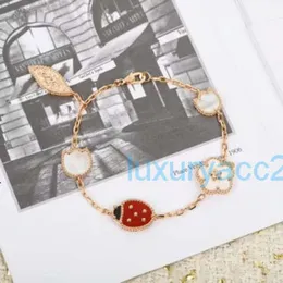 van clover bracelet Four Leaf Grass Ladybug Five Flower Bracelet Female Electroplated True Gold Non fading White Fritillaria Live