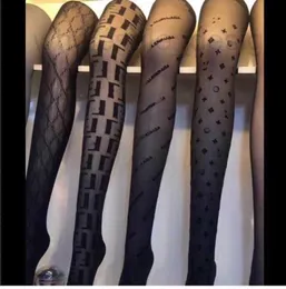 Socks & Hosiery Designer letter plush pantyhose hollowed-out fishnet stockings flesh penetrating sexy bottoming flocked pants stockings 69PB
