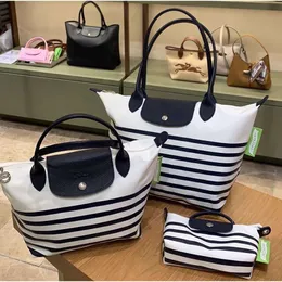 Lyxdesigner Handags Longxiang Dumpling Bun New Nylon Navy Stripe Bun Mini Handheld One Shoulder Phone Bag Color Block Bag