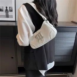 Niche française petit été nouveau haut de gamme texture sac à bandoulière femmes une épaule sous les bras sac à main 7889