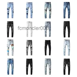 Designer Jeans da uomo Hip-hop Moda Pantaloni con cerniera con foro Lavaggio Retro Cuciture piegate strappate Design da uomo Moto da equitazione Pantaloni slim blu cielo per donna 28-40 8RZZ