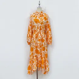 Australische designerjurk linnen oranje bloemenprint overhemdjurk met revershals en lange mouwen