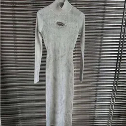 24SS Дизайнерские женские топы Disel Высококачественная длинная юбка с нишей американского дизайна D-line 2023, осень и зима, новая выдолбленная трикотажная длинная юбка в западном стиле