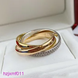 8W7F Bandringar Trinity Ring Charms för kvinnans designer Parstorlek 678 Man Diamond Tricyclic Crossover T0p Quality Gold Plated 18k Officiella reproduktioner a