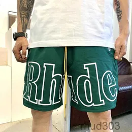 Högkvalitativ Rhude Mesh Quick Dry Shorts Designers Mäns basket Korta byxor 2024 Luxury Summer Beach Palm Letter Street Fashion Sweatpantsn5ZB N5ZB