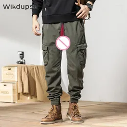 Calças masculinas homens carga sexy virilha aberta casual zíper outono inverno corredores streetwear tático militar ao ar livre calças de sexo traje