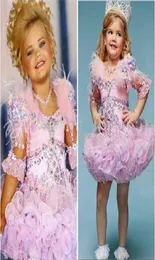 Güzel Eden Ahşap Pembe Bebek Yürümeye Başlayan Pageant Elbiseler Kızlar için Glitz Rhinestones Balo Gown Pembe Tüylü Çocuk Parti Elbiseleri 20175468109