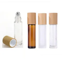 Garrafas de embalagem por atacado 10ml de vidro óleo essencial rolo âmbar claro em óleos garrafa de bambu tampa de aço inoxidável rolo bola gota deliv dhlvr