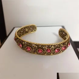 Bangle New Fashion Armreifen gestreifte Blütenstrücksteine Einfache Uni siger plattierte Retro -Armband Drop Lieferung Schmuckarmbänder DHGF5 DHGF5