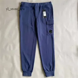 Męskie CP Companys Pants Kolor ukośne polarowe CP Company Spodnie Mieszane spodnie użytecznościowe One Lens Pocket Spit CP Kamień kompagny i wyspa 4162