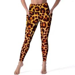 Leggings femininas na moda estampa leopardo calças de yoga bolsos animal sexy cintura alta calças esportivas design de secagem rápida ginásio leggins