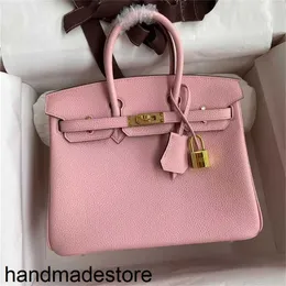 Bolso de diseñador de platino cosido línea de cera francesa patrón de lichi piel de becerro Togo bolso de mujer versátil de moda privado