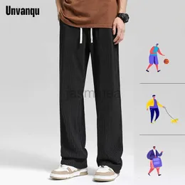 Мужские брюки UNVANQU, 100% полиэстер, мужские весенне-осенние повседневные брюки для бега High Street, универсальный дизайн, модные тканевые брюки в широкую полоску Workout240125
