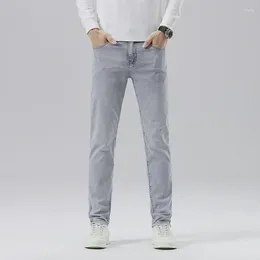Mäns jeans faller avancerad tvätt vintage modemärke grå stretch smala långa byxor för män