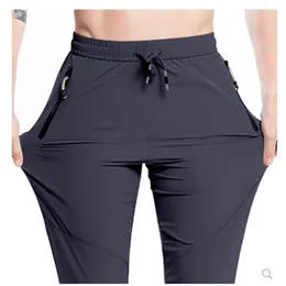 Calça masculina primavera na primavera na cintura elástica de cordão reto e reto fino fino de todas as tendências casuais tendências homens roupas