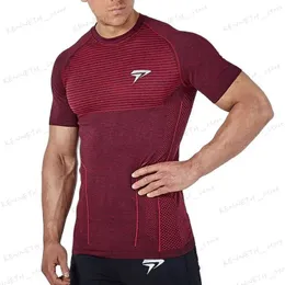 T-shirt da uomo 2022 Nuovi uomini che corrono stretti T-shirt corta Compressione T-shirt ad asciugatura rapida Maschile Palestra Fitness Bodybuilding Jogging Tees Tops Abbigliamento T240126