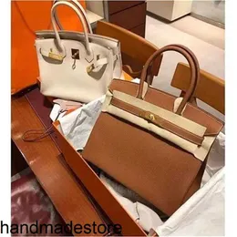 نمط الملفوف الحقيقي حمل البقر البلاتين البقر Lychee BACKES BAG Propelectile Fashion Bag Crossbody Bag Lundarm Counter Bag مع شعار