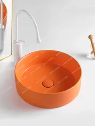 Badezimmer-Waschtischarmaturen, nordisches Tischbecken, orangefarbenes rundes Waschbecken, einzelne kleine Größe, kreativer Balkon, Keramik-Haushaltswaschbecken