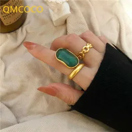 Anéis de banda Qmcoco prata cor anéis de casamento para mulheres moda design criativo pedra verde vintage festa noiva jóias acessórios 240125