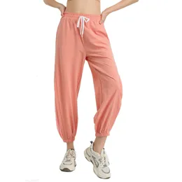 Al Yoga bär kvinnor nionde joggingbyxor redo att dra rep joggers stretchy hög midje träning rem byxor 3 färger yK010 mode