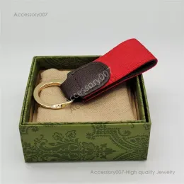 Desigenr المجوهرات الأزياء المعدنية الأيقونة المفتاحية الكلاسيكية أنيقة Keyring النساء الرجال الفاخرة قلادة للجنسين مصممة العاشق ملحقات المجوهرات سلسلة حلية الحلية مع صندوق