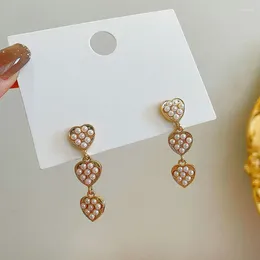 Pendientes colgantes Vintage decoración de perlas de imitación corazón de Color dorado para mujer moda borla larga gotas joyería coreana Pendientes de fiesta regalo C304