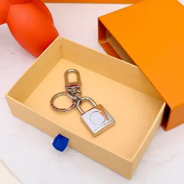 Designer Alloy Keychain Keyring Fashion Purse Pendant Car Chain Charm Brown Flower Mini Bag Trinket Gifts Accessories jone-25183E