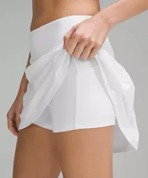 Frete grátis feminino esportivo de ioga Salta de treino Shorts zíper plissado Tennis Golf Skirt Fitness Running Short com bolso