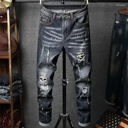 Mäns jeans 2024 Rippad denim Patch Motorcykelkläder Street Stretch Youth All-Match Party Pants