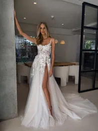 2024 Bohemian Western Country A Line Wedding Dresses Beach Spaghetti Straps Illusion Tulle ärmlösa spetsapplikationer 3D blommor brudklänningar sida delad öppen rygg