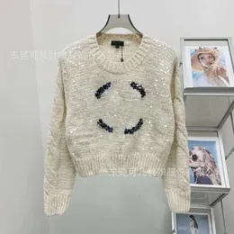 Sweter designerski Kobiety Xiaoxiangfeng okrągły szyja cekina podwójna c kolor wełna wełniana słodka wiek redukujący sweter pullover 2024 wczesna wiosna Wiadomości